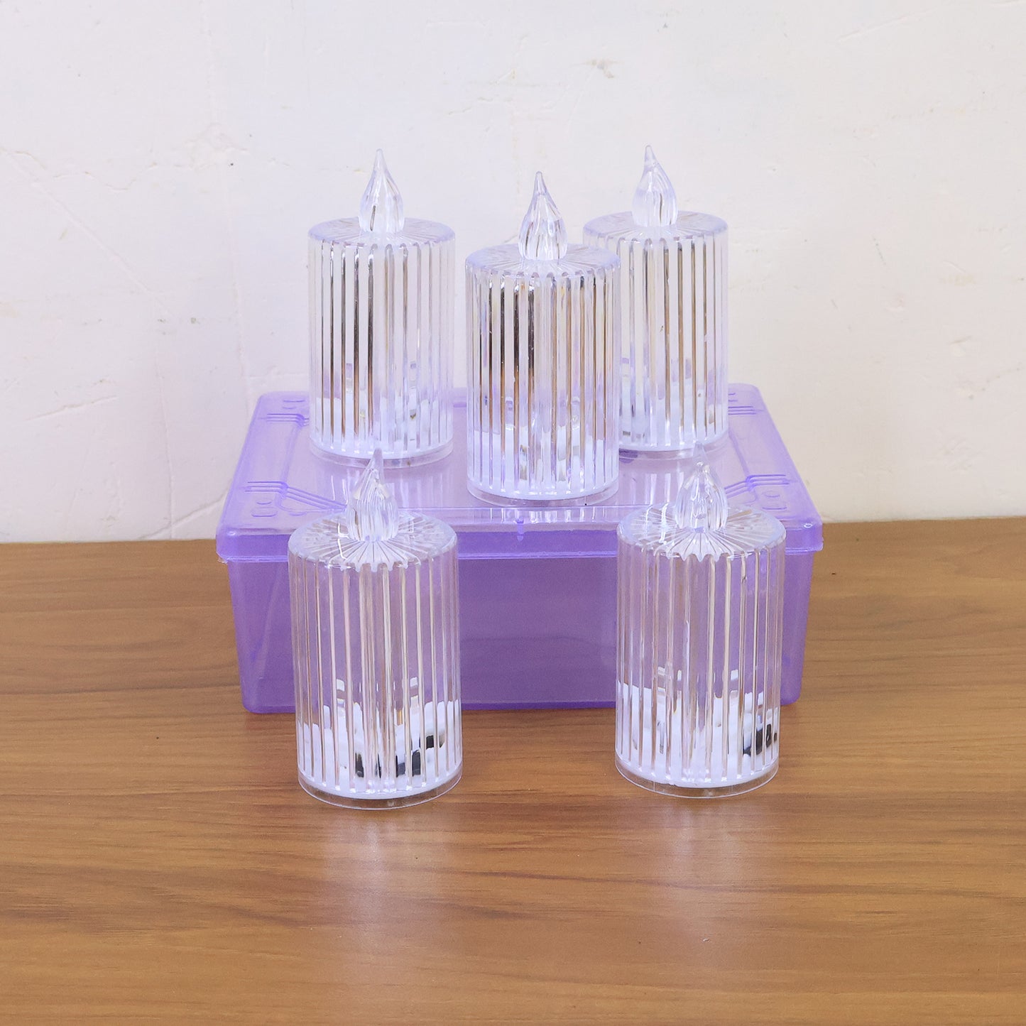 Set of five Wukusy crystal effect LED flameless candles for home decor, featuring realistic flickering candlelight.