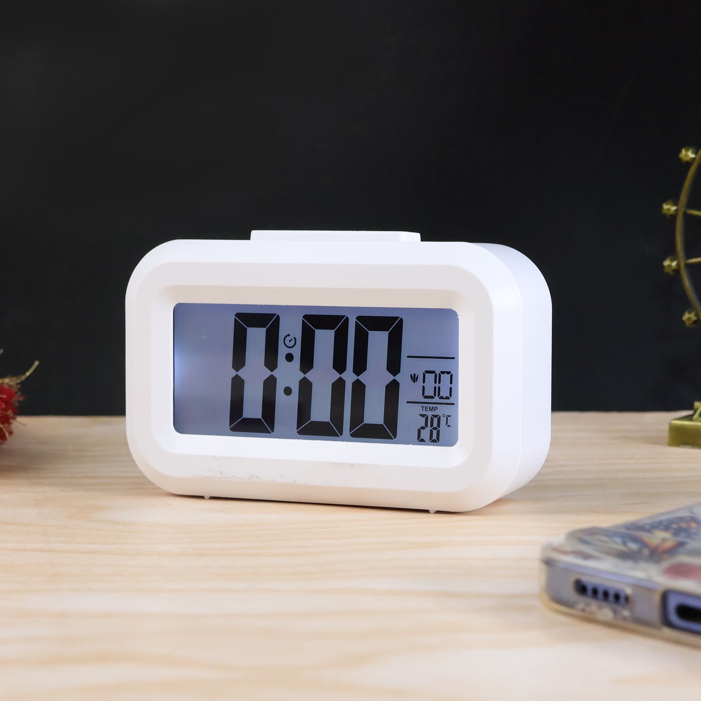 Modern digital LED alarm mini clock by Wukusy showing time display with sleek black design for home improvement.