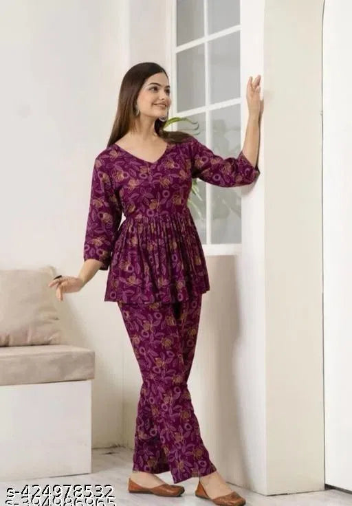 Purple women's printed co-ord set with matching top and pants, stylish and comfortable for girls and women.