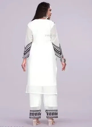 White women's kurta with matching bottomwear from 15801 women's kurta sets, casual ethnic wear for women.