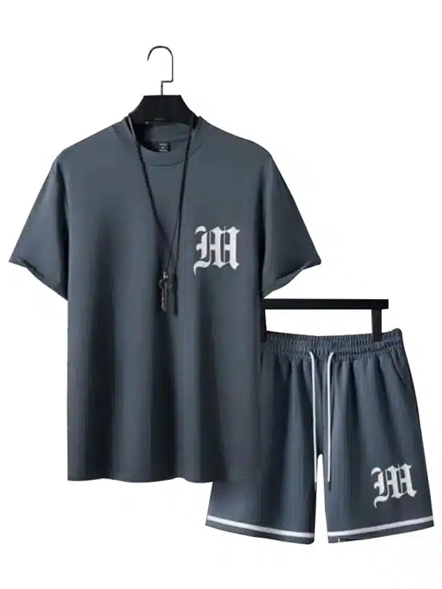 Men's grey printed tracksuit by 1634, featuring a comfortable fit and stylish design, shown on a model.