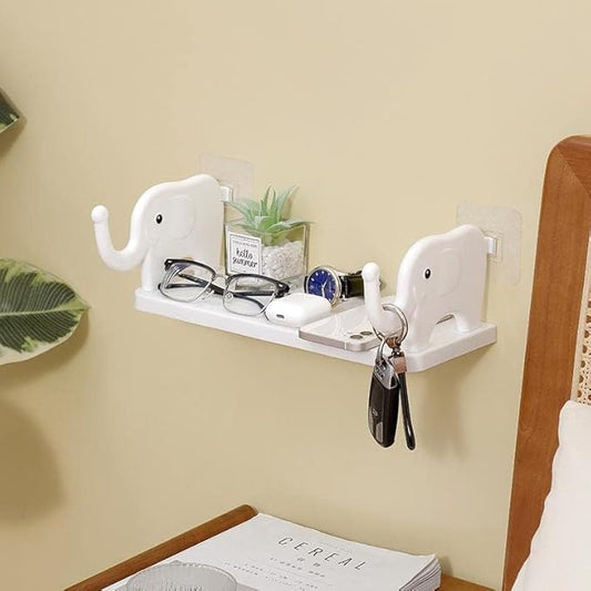 Colorful elephant-shaped multipurpose stand holder for bathroom, kitchen, or office, with strong magic sticker wall mounting.