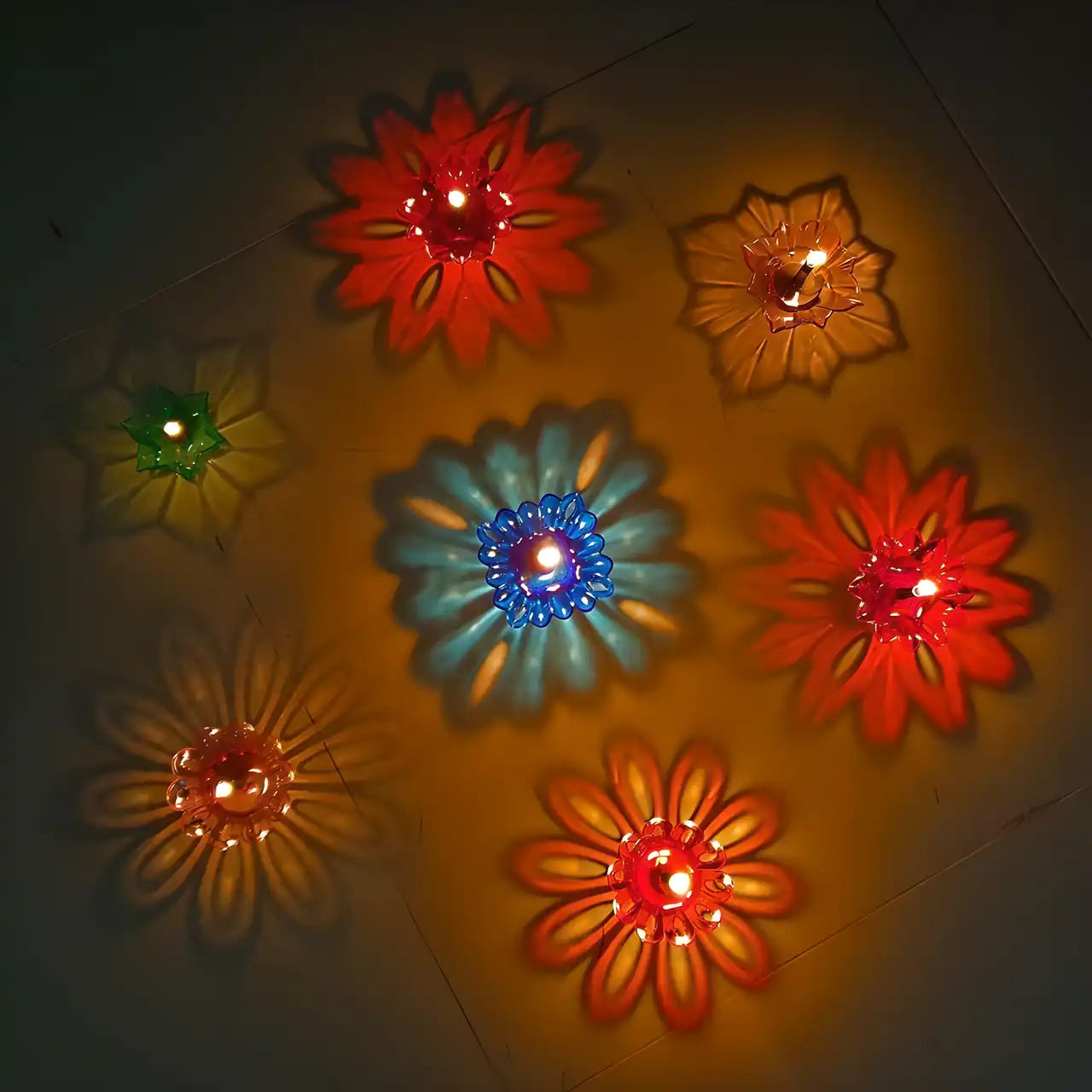 Set of 12 3D Diya Diwali decorations with intricate designs, perfect for festive celebrations and home decor.