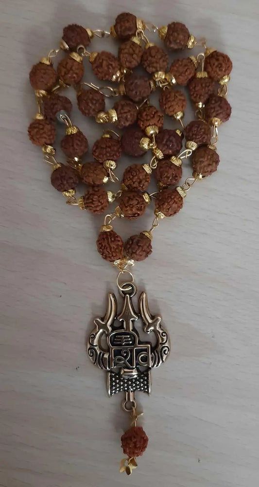 Gold plated Rudraksha chain for pooja, featuring intricate design and sacred beads, ideal for religious rituals and spiritual offerings.