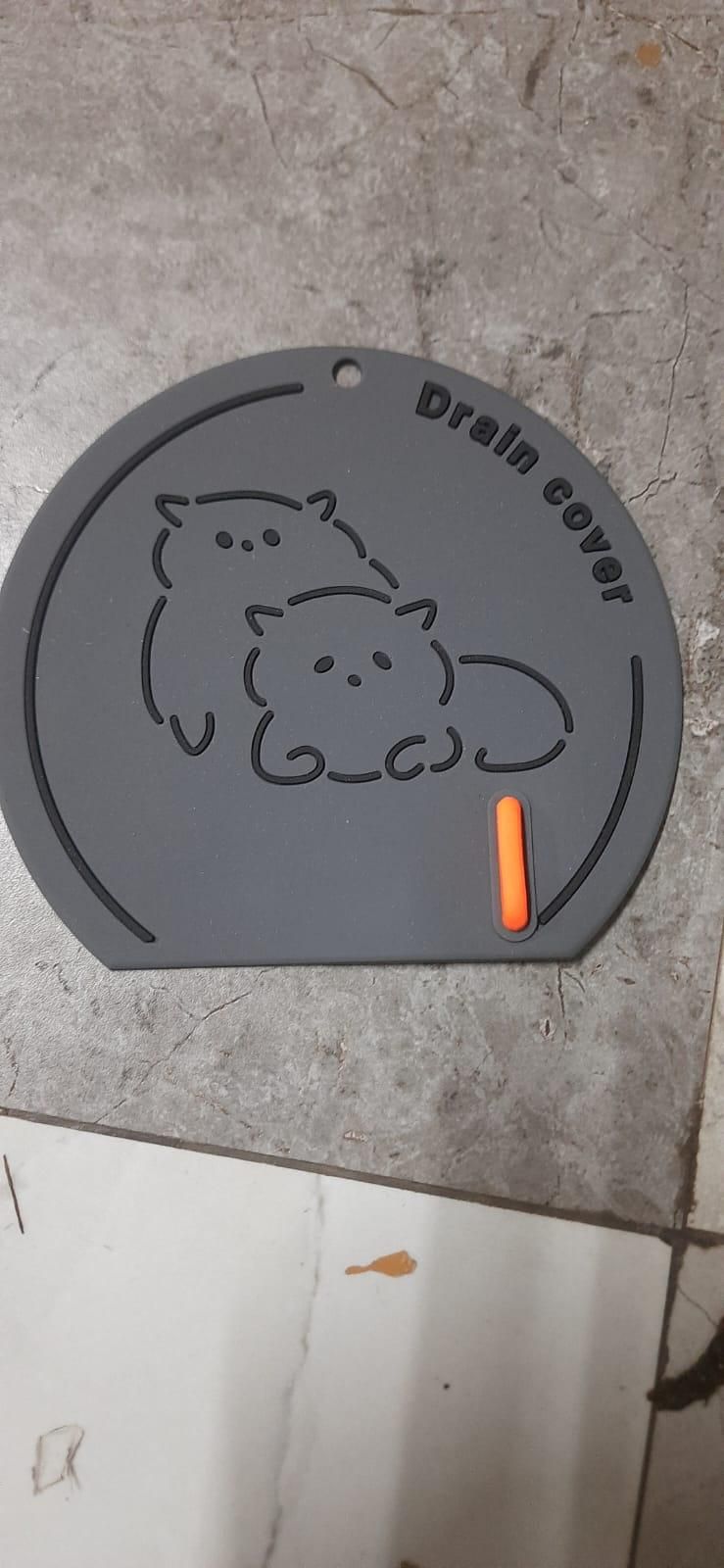 Thick silicone floor drain deodorant cover from 19378 kitchen tool set, designed to fit and seal floor drains effectively.