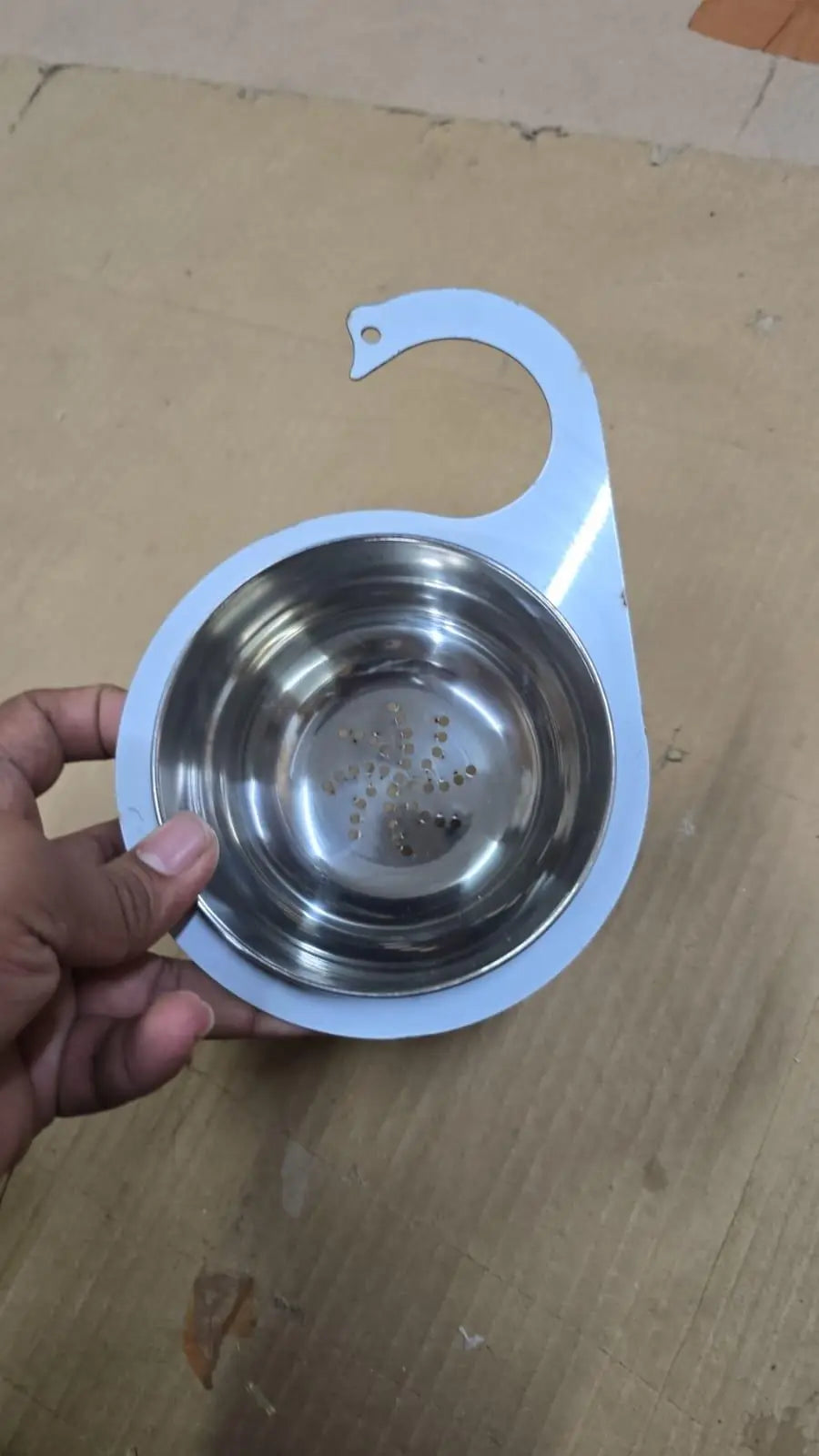 Stainless steel Swan Drain Basket sink strainer from Kitchen Tool Sets by 19378, with a sleek, durable design for kitchen drainage.