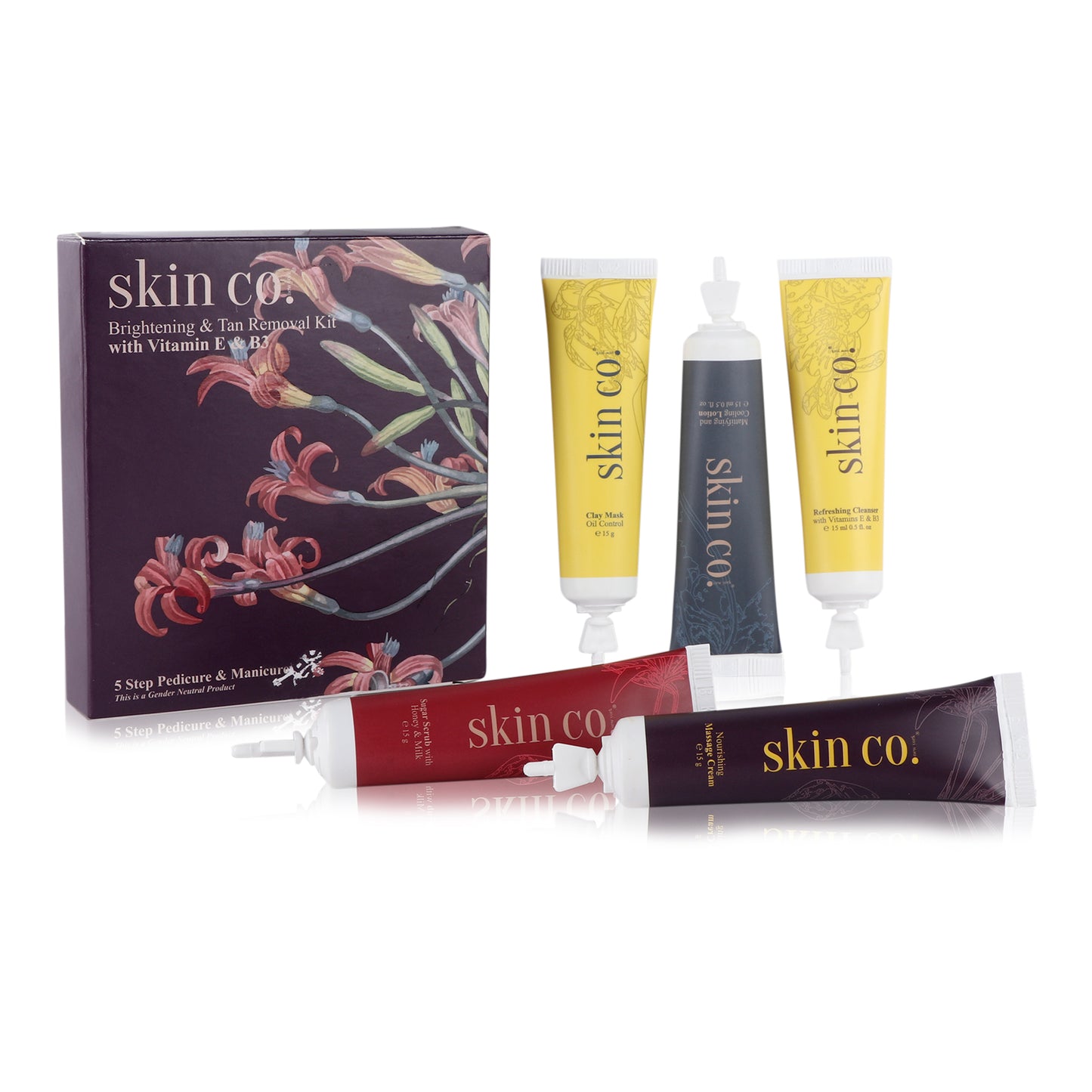 Skin Co. NYC Brightening & Tan Removal Facial Kit with colorful spa tools for pedicure and manicure treatments.