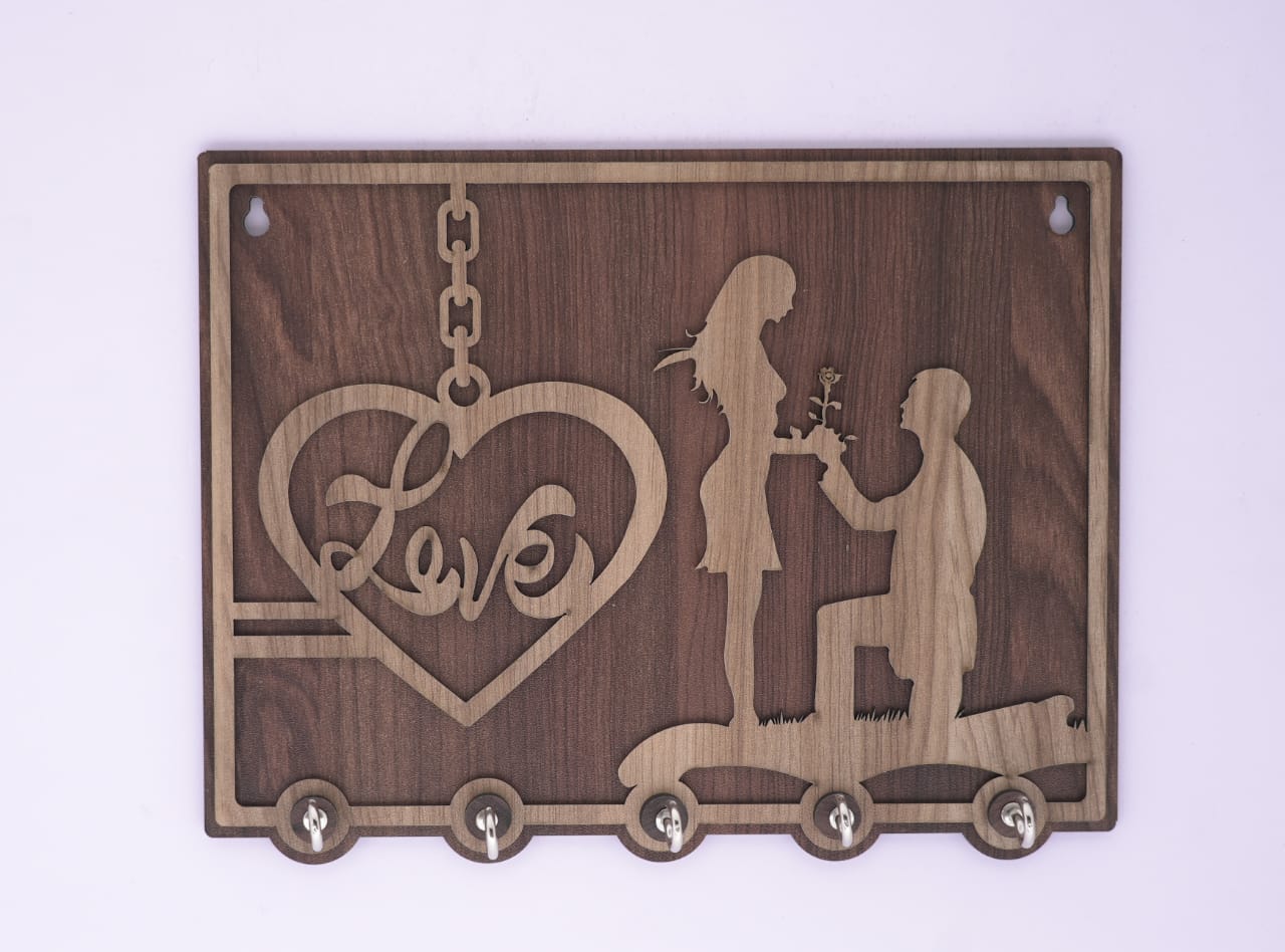 Brown Love Wooden Keyholder by 18309 featuring a decorative heart design and multiple hooks for keys and accessories.