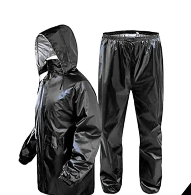 Black polyester full sleeves rainsuit set for men in XL size, featuring a waterproof raincoat with hood and matching pants.