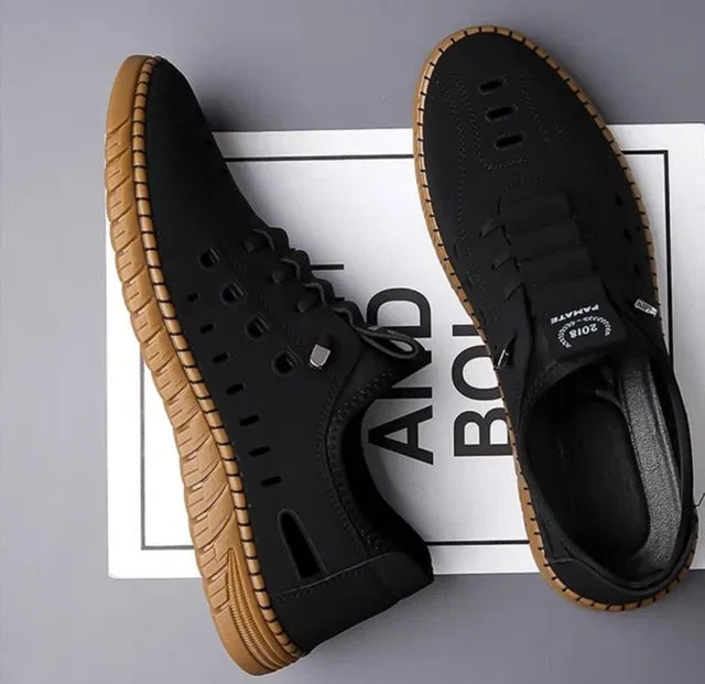 Men's casual black shoes by 18644, featuring a sleek design and comfortable fit, perfect for everyday wear.