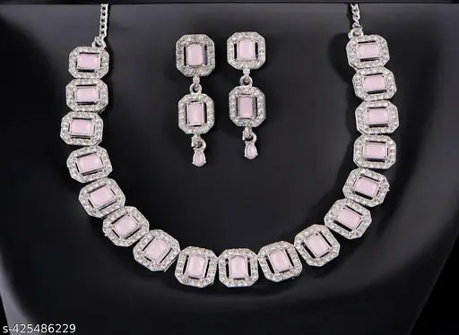 Silver jewelry set for women featuring earrings and necklace, crafted by New Tready in a stylish, elegant design.