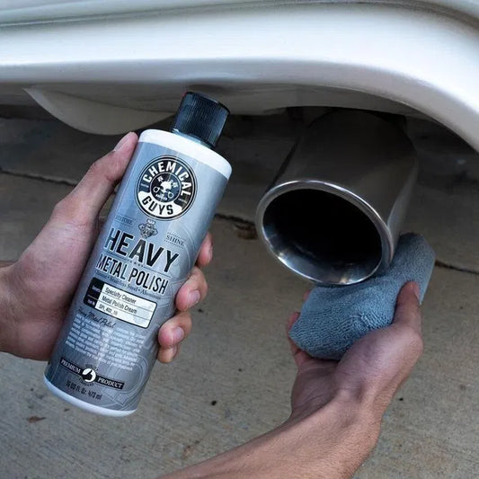 Metal polish 100ml from 21334, suitable for car brushes and dusters, with a sleek metal container and applicator brush.