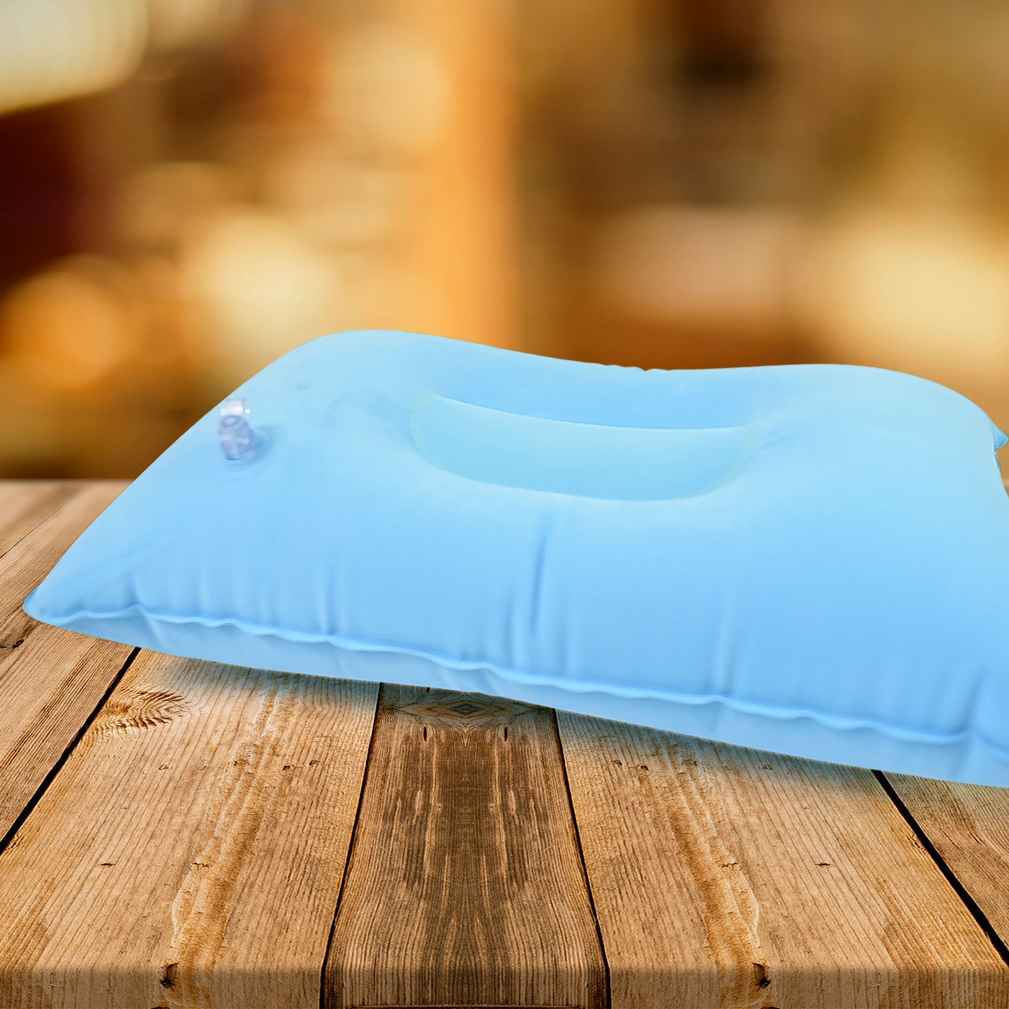 Wukusy comfortable inflatable travel pillow in mixed colors, compact design, suitable for neck support during travel.