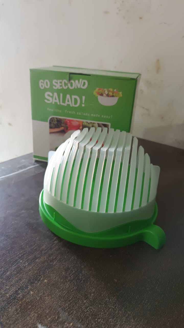 Wukusy plastic 60 seconds salad cutter and maker bowl for quick, easy salad preparation in the home kitchen.
