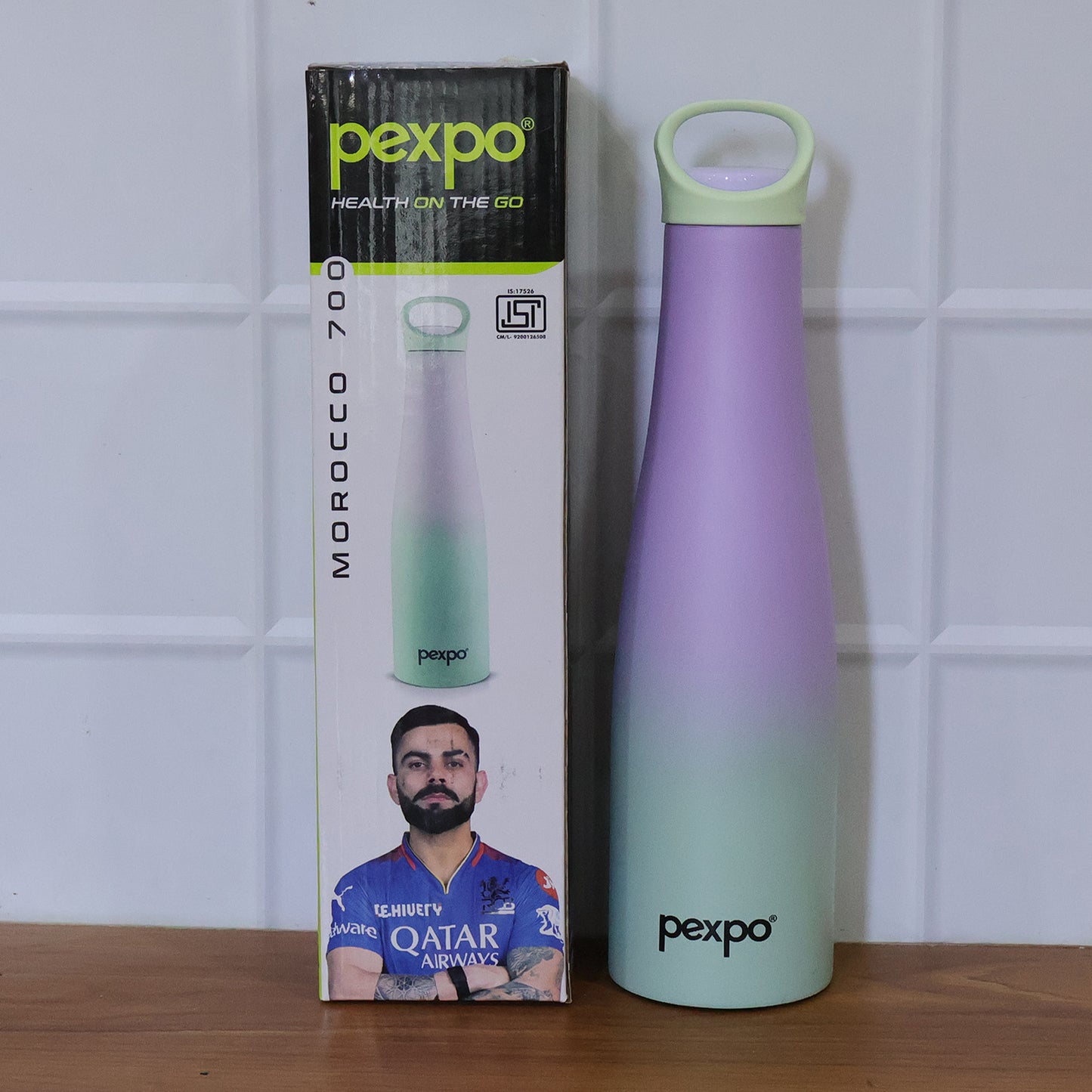 Wukusy Pexpo Morocco stainless steel water bottle, 700ml, hot and cold vacuum insulated, with a sleek silver finish.