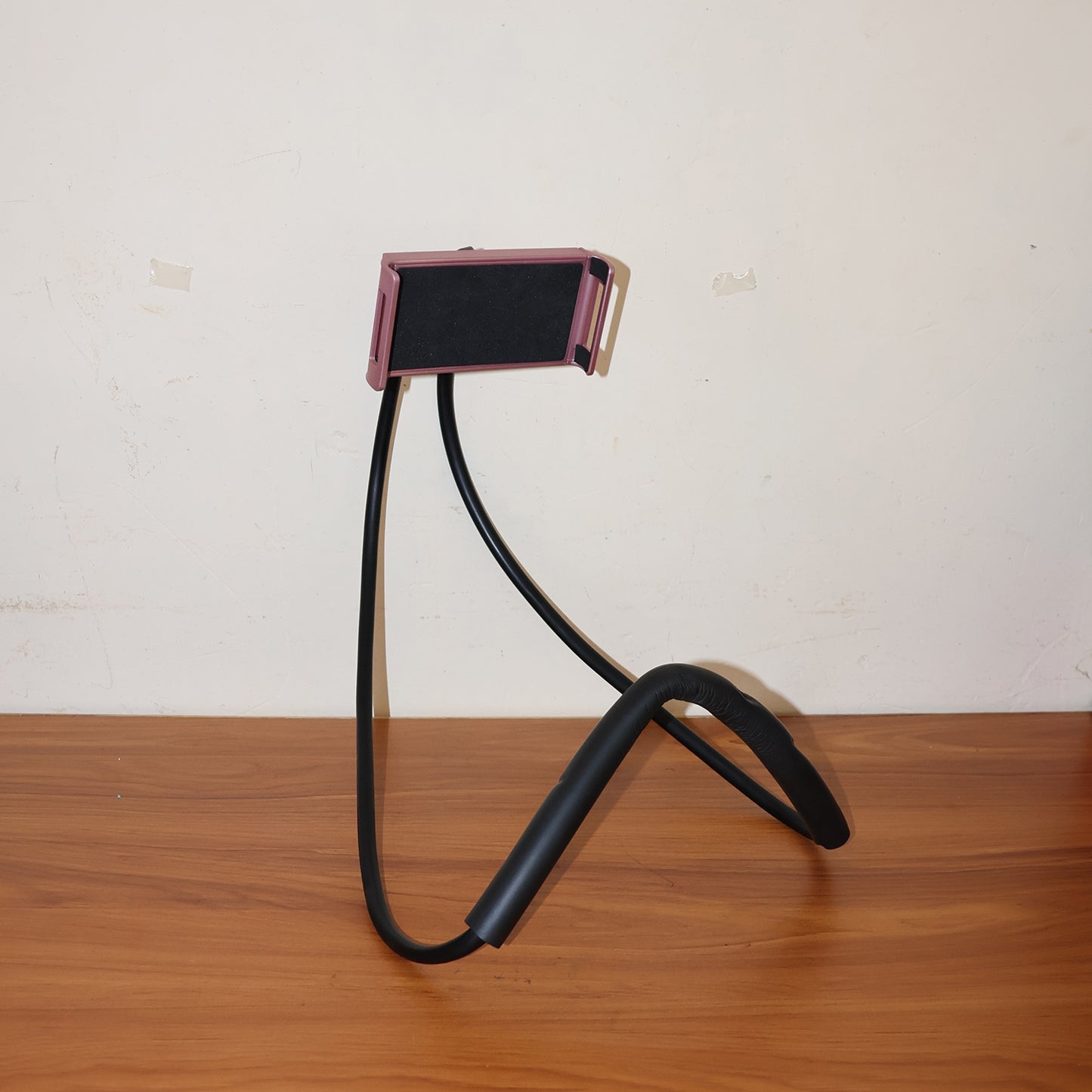 Wukusy neck phone holder desktop lazy stand with adjustable support for hands-free viewing of smartphones.