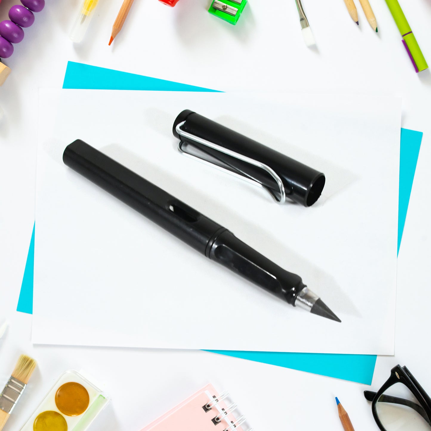 Wukusy 2-in-1 everlasting refillable pencil with replaceable eraser head, inkless, reusable, ideal for kids' painting and stationery.