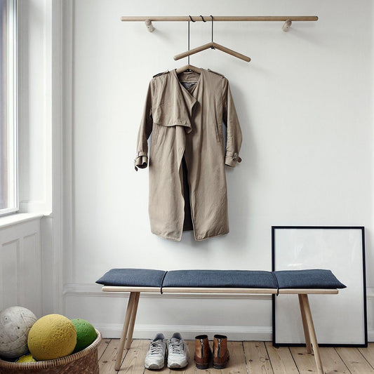 Wooden clothes hanger by Wukusy, sturdy suit and coat hanger made from natural wood for home organization.