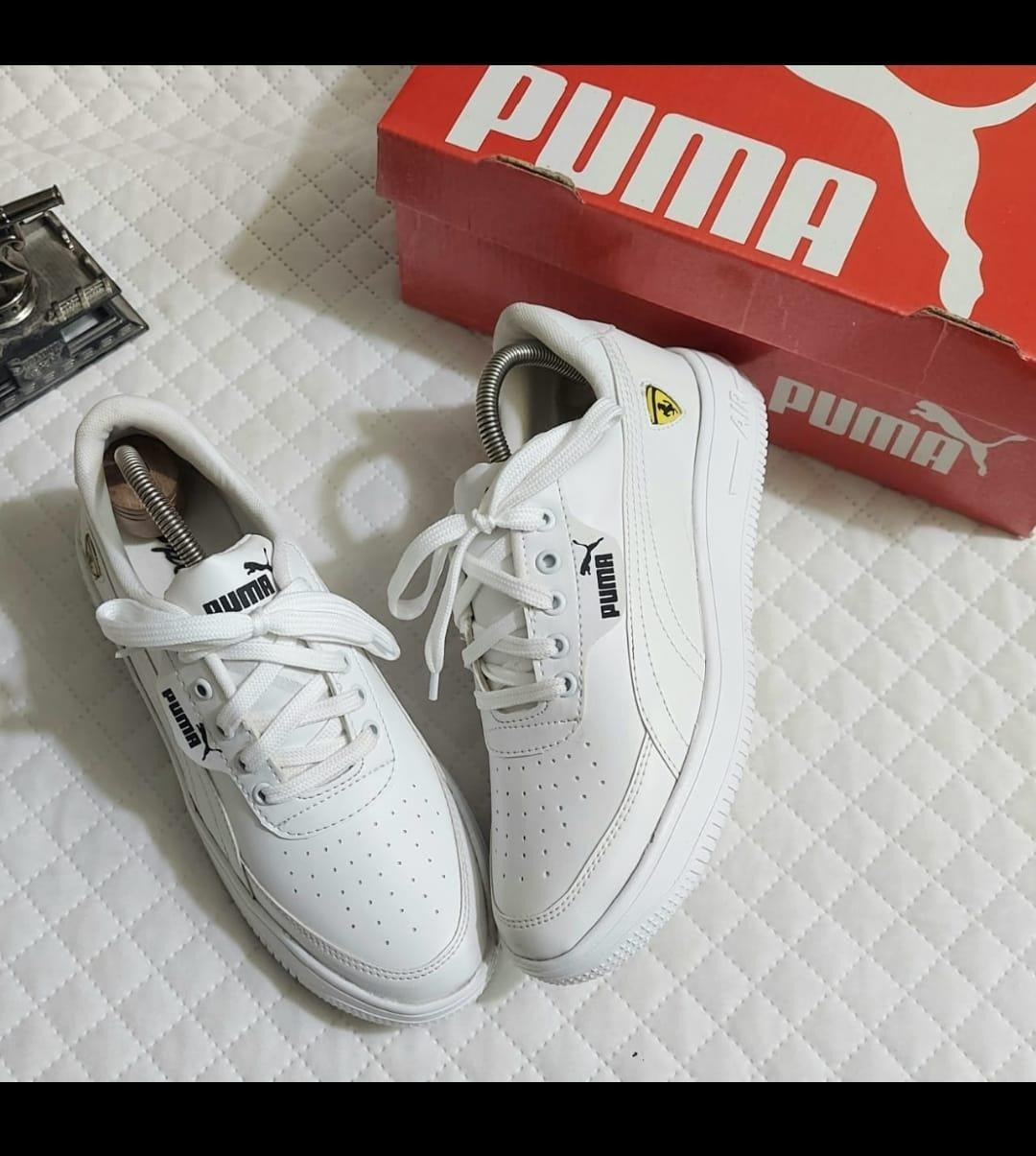 White men's sneakers by 4597, size 6, with clean design and comfortable fit, perfect for casual wear.