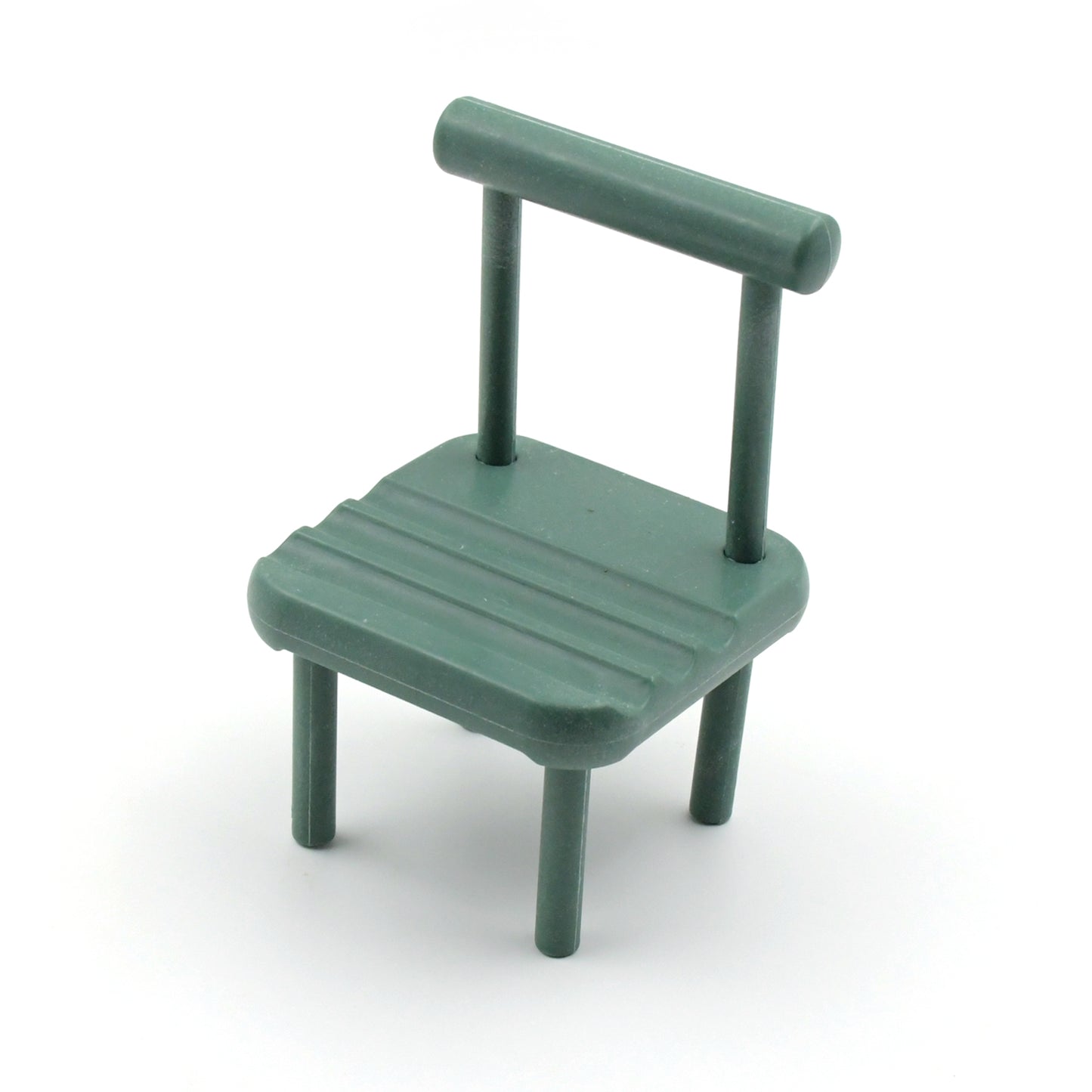 Wukusy portable mini chair mobile phone holder on a desk, compatible with all smartphones, designed for convenient desktop use.