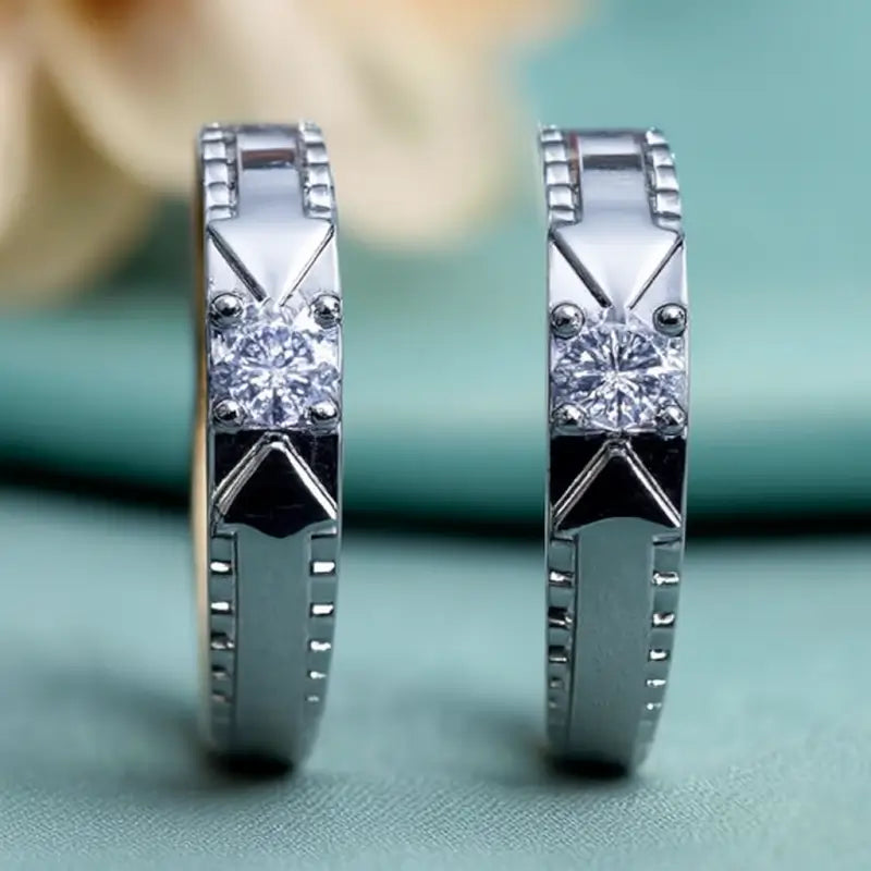 Adjustable silver-plated sterling twin flame couple rings with American diamonds, showcasing intricate design and free size fit.