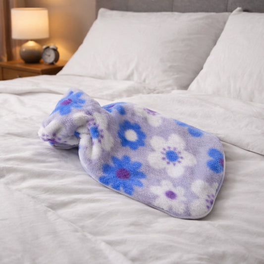 Wukusy floral printed soft plush hot water bag with cover, 19x12 cm, featuring colorful floral design and cozy plush material