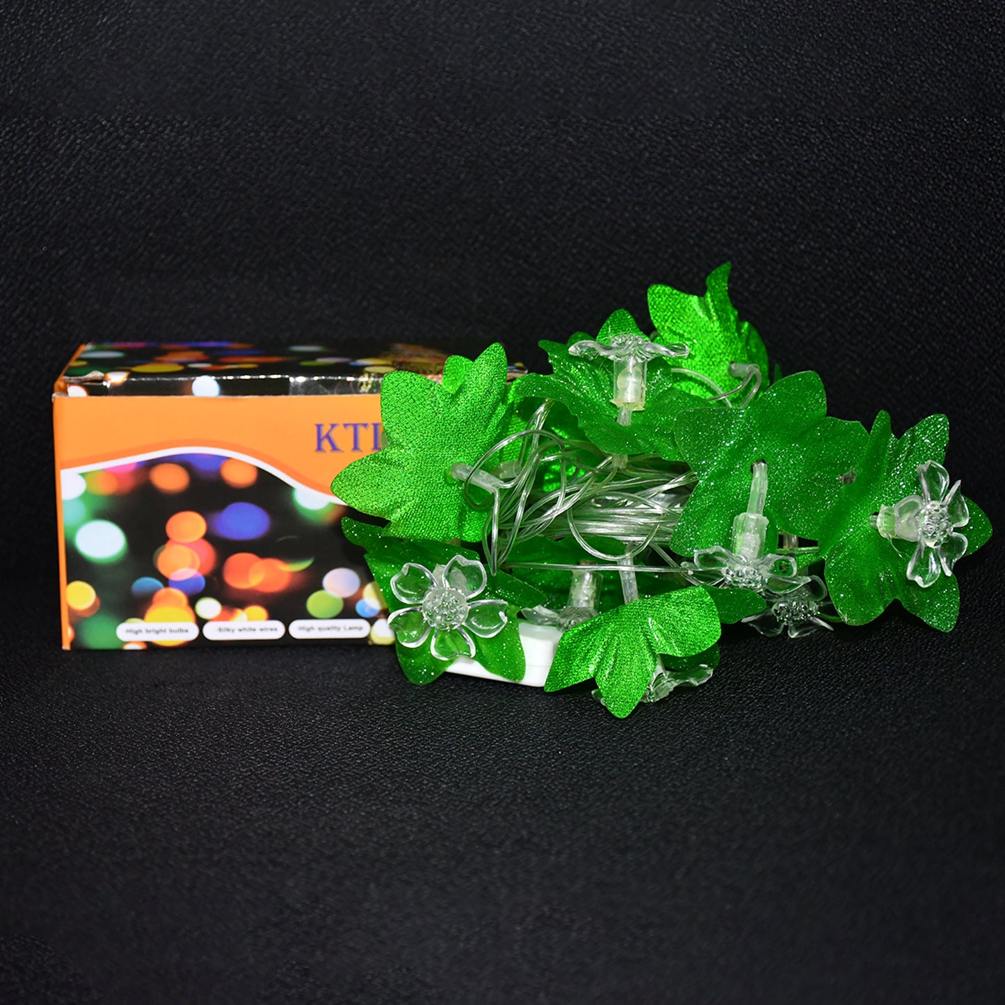 Wukusy leaf and flower LED decorative string light, 3 meters long, with warm white LED bulbs and leafy floral design.