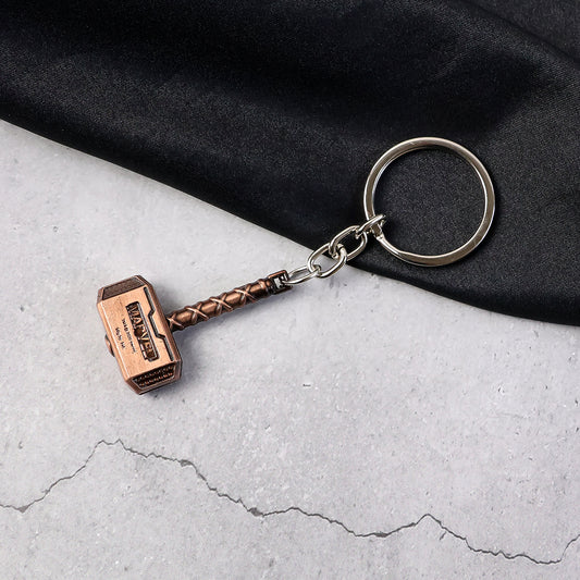 Wukusy metal hammer-shaped keychain accessory with detailed hammer design, perfect for keys or decorative use.