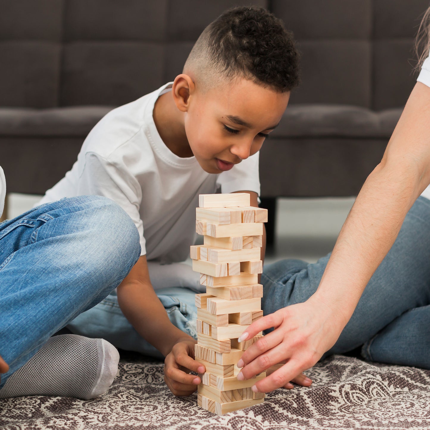 Wukusy 1911 54-piece wooden stacking and tumbling toy blocks with 4 dice for creative building and play.