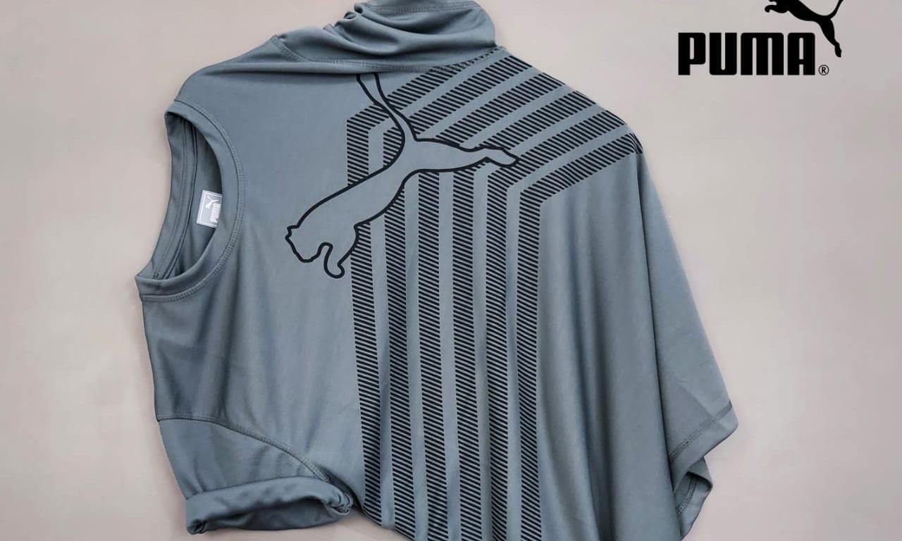 Grey Puma men's trending T-shirt in size S, casual men's T-shirt with a comfortable fit and Puma branding visible.