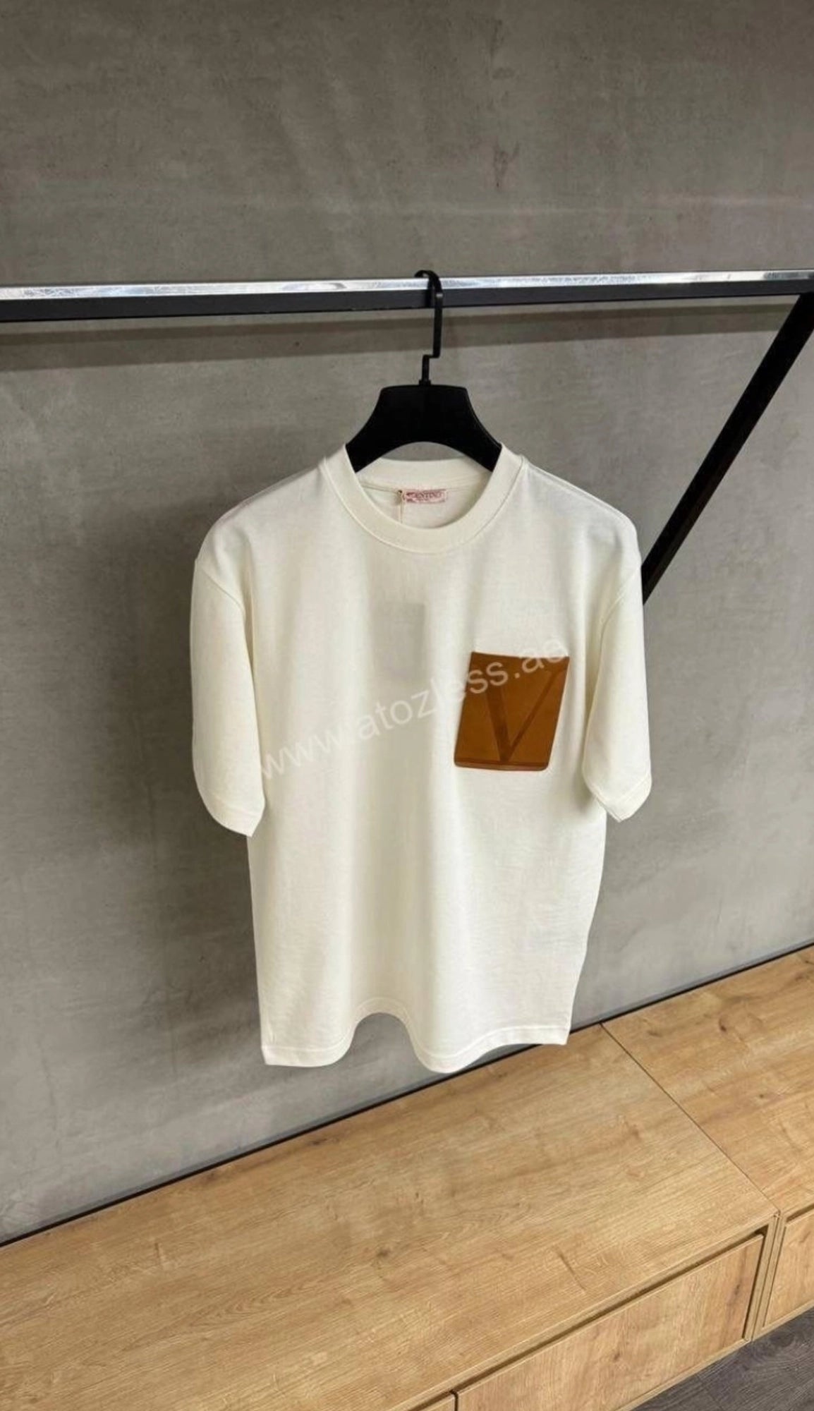 White Valentino printed men's T-shirt, size M, featuring bold graphic design on soft cotton fabric.
