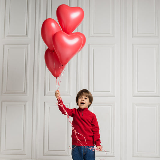 Set of 20 multicolor heart-shaped latex balloons by Wukusy, ideal for rainbow-themed birthday, anniversary, wedding, or Valentine’s party.