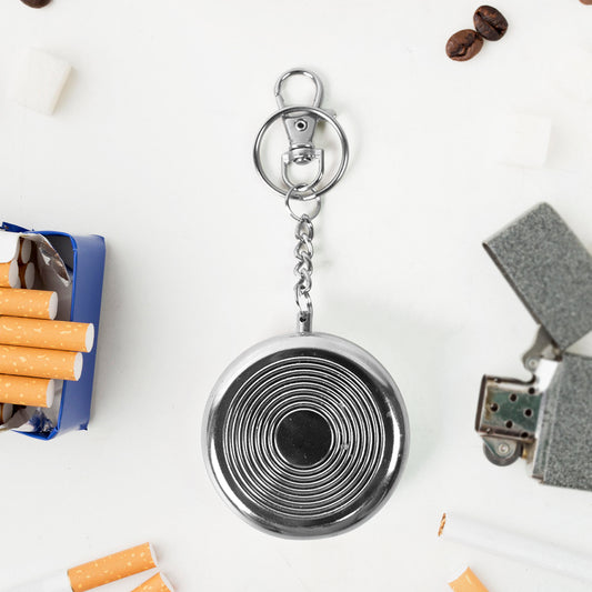 Wukusy mini pocket ashtray with keyring, compact metal design for discreet cigarette disposal, suitable for home or travel use.