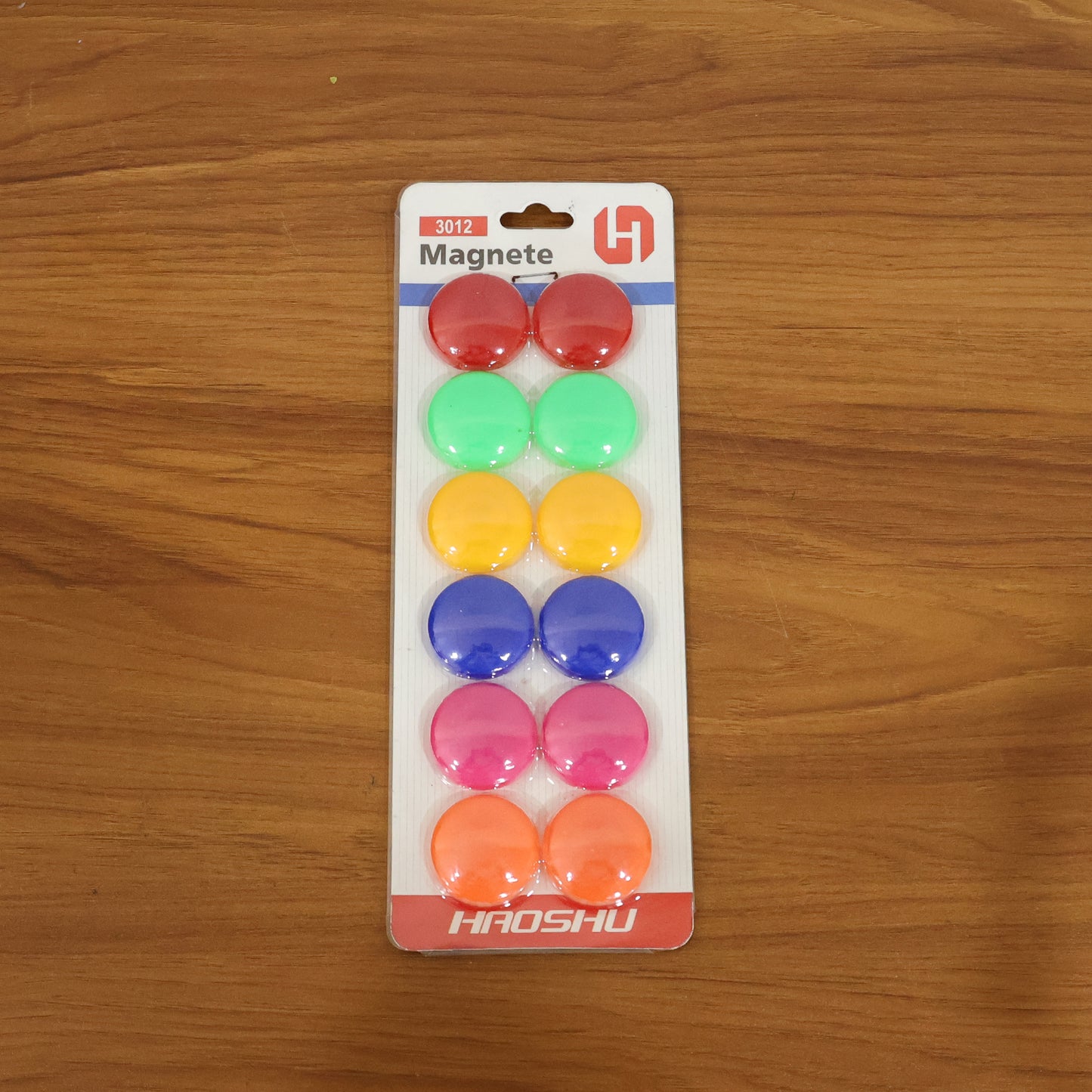 Set of 12 colorful round refrigerator magnets with vibrant patterns, perfect for decorating and organizing your fridge.