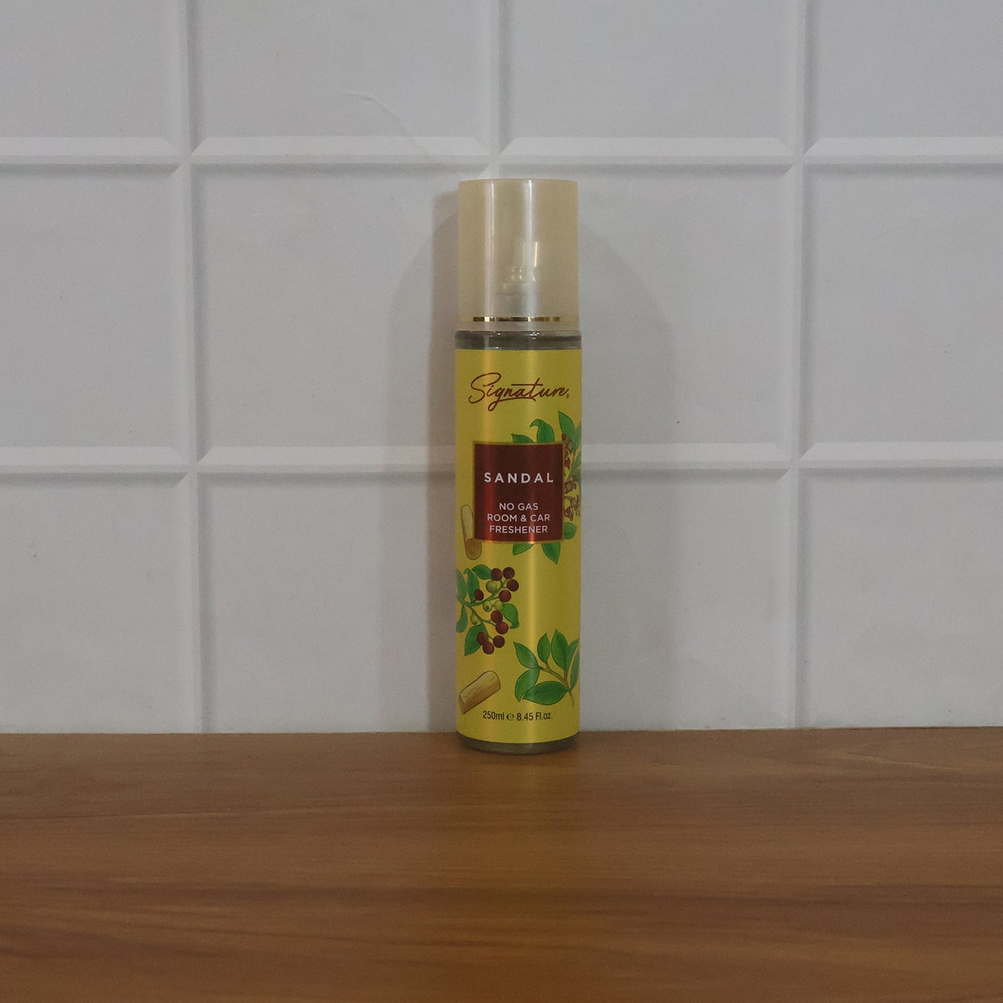 Wukusy Signature Sandal Room Car Freshener Spray 250ml with a sleek spray bottle and sandalwood scent label.