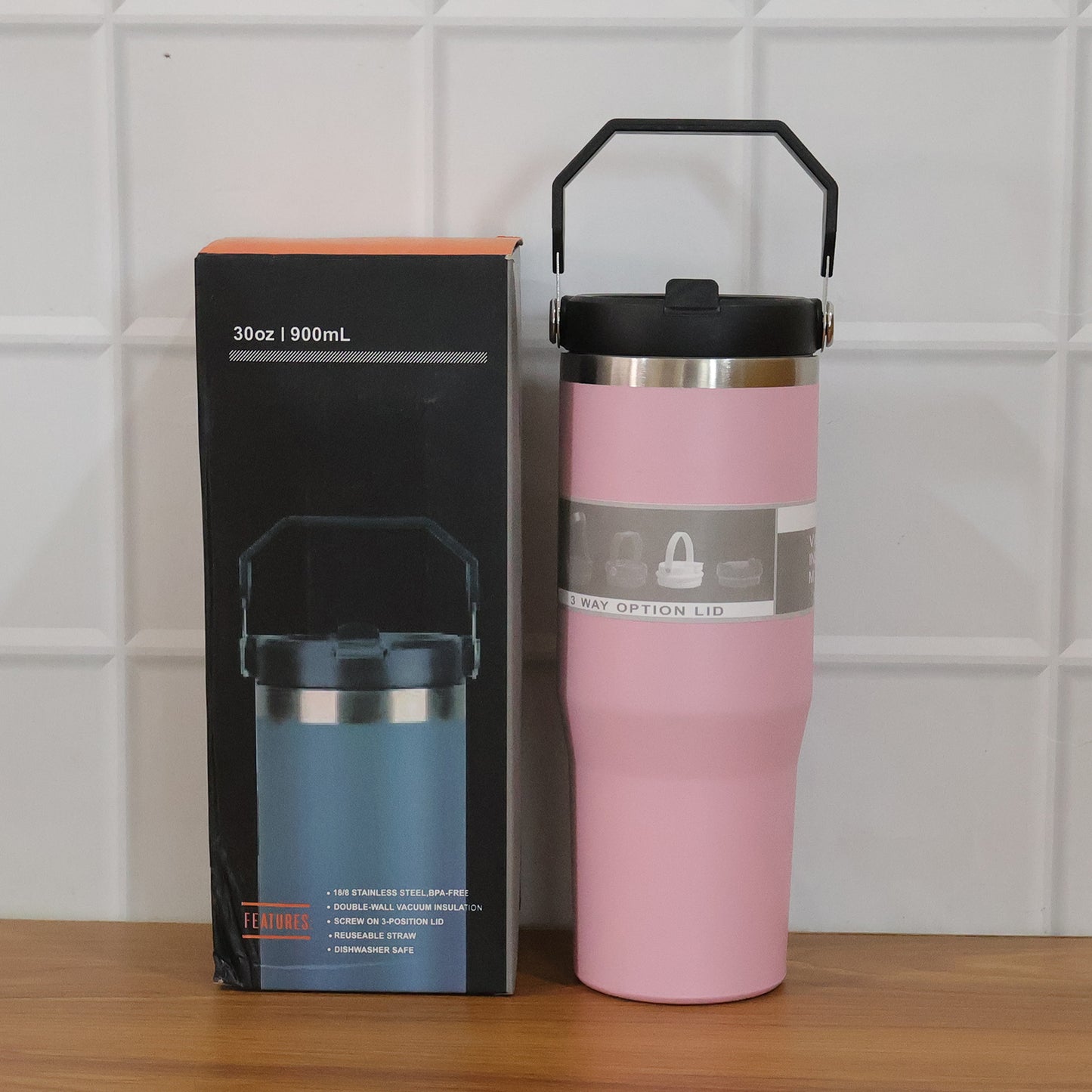 Wukusy premium stainless steel insulated travel tumbler, 900ml capacity, with a sleek design and secure lid for hot or cold drinks.