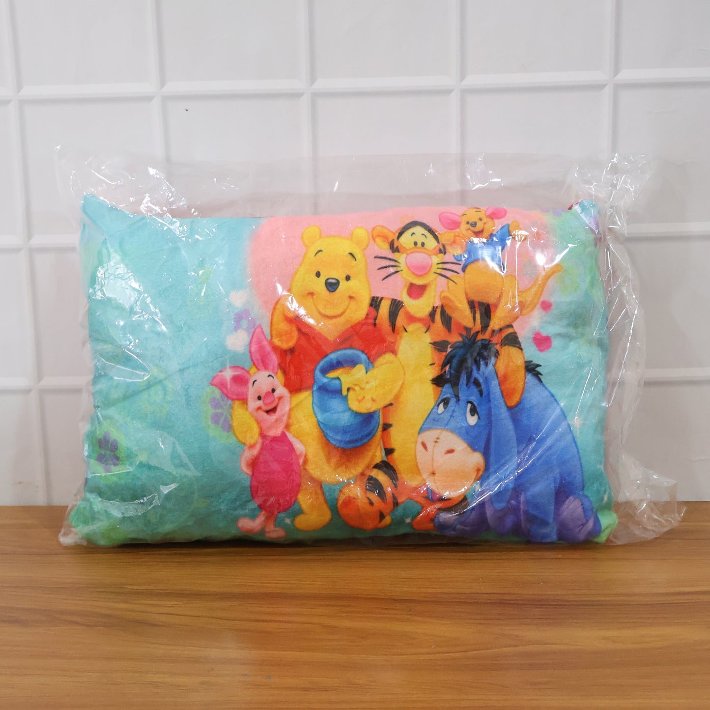 Soft plush cartoon character kids pillow by Wukusy, 40x25 cm, featuring colorful plush fabric and playful character design.