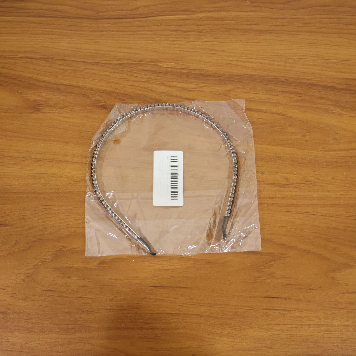 Black crystal-studded metal hair band by Wukusy, elegant hair accessory with sparkling details for stylish hair styling.