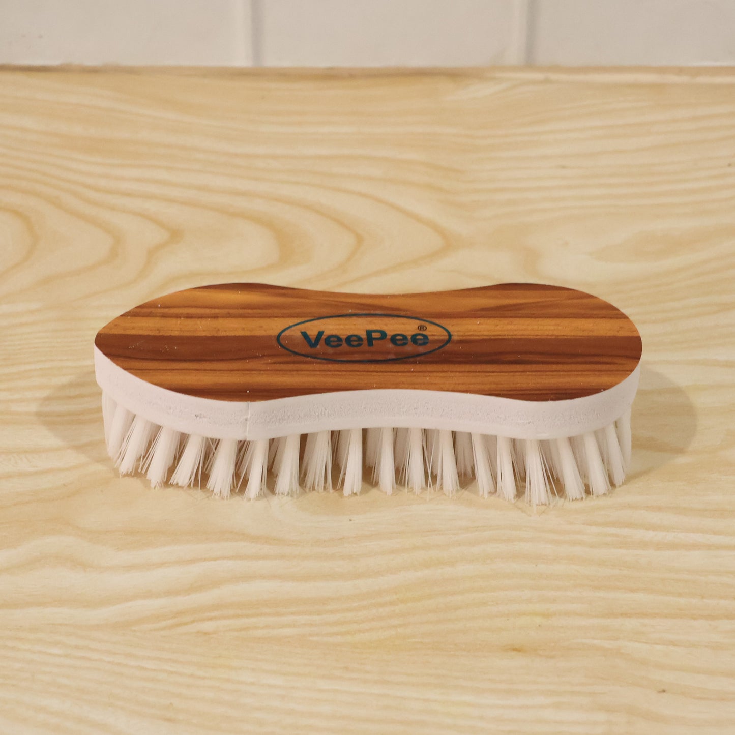 Wukusy Veepee ergonomic cloth washing brush with wooden handle and soft bristles for gentle cleaning of fabrics and clothes.