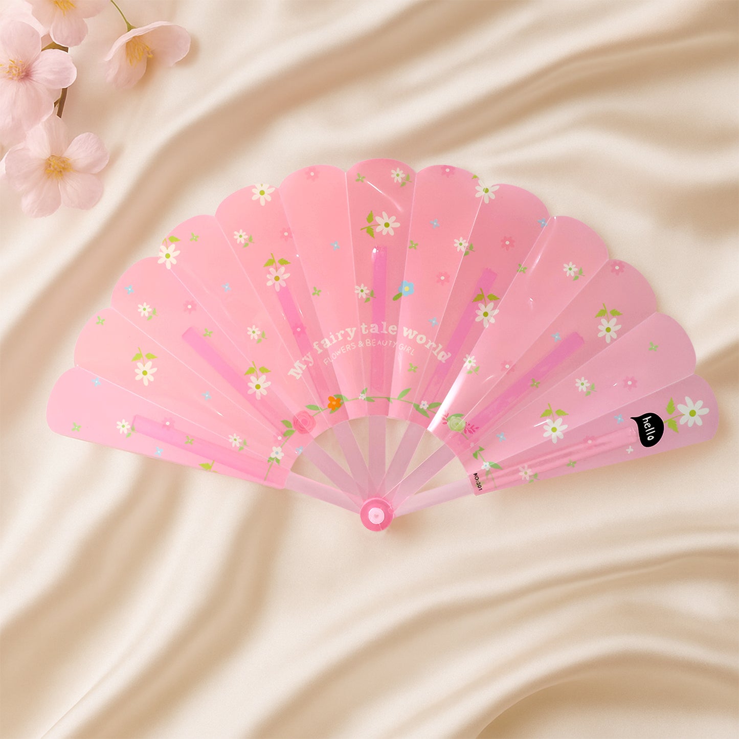 Foldable hand fan with floral print by Wukusy, showing vibrant colorful flowers on lightweight, portable design.