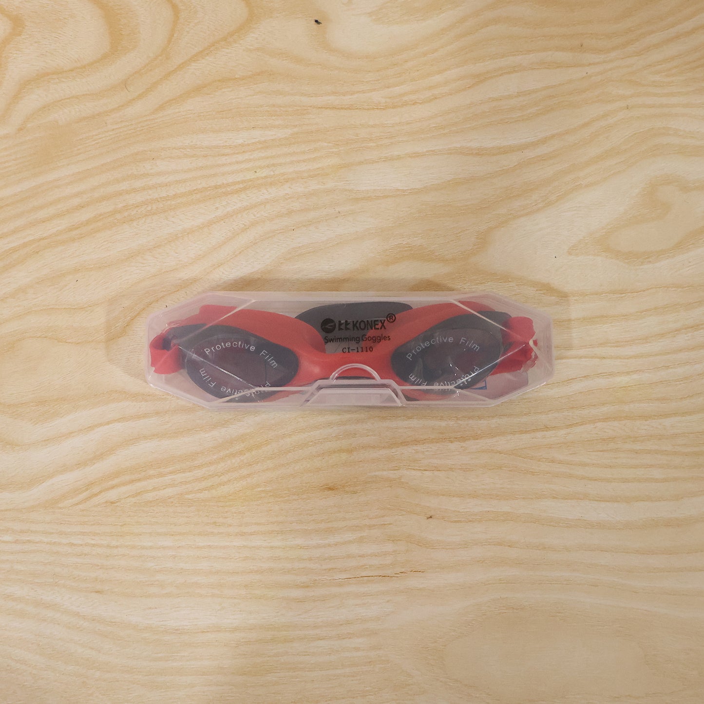 Wukusy premium swimming goggles with adjustable strap, clear lenses, and comfortable fit for competitive or recreational swimming.