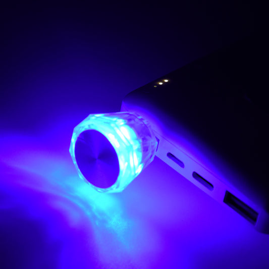 Wukusy diamond-shaped Mini USB LED light in white, used for car and home decoration, creating ambient lighting effects.