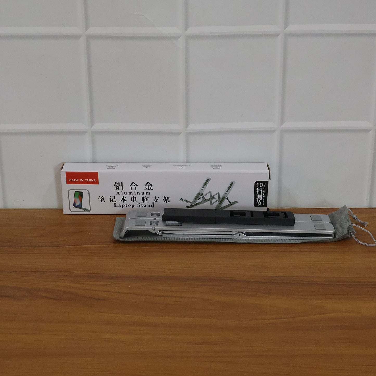 Wukusy adjustable foldable aluminium laptop stand with ergonomic design, compact and lightweight for portable use