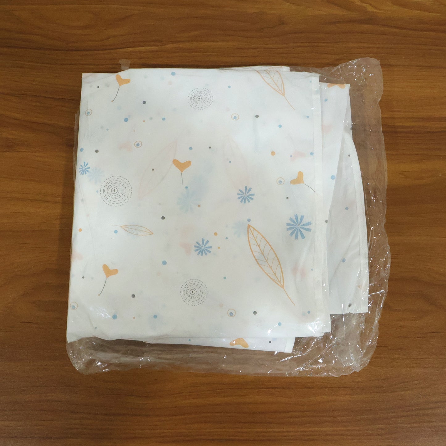 Wukusy premium hanging clothes storage cover bag drapes over wardrobe, protects clothing from dust, and measures 120 cm in length.