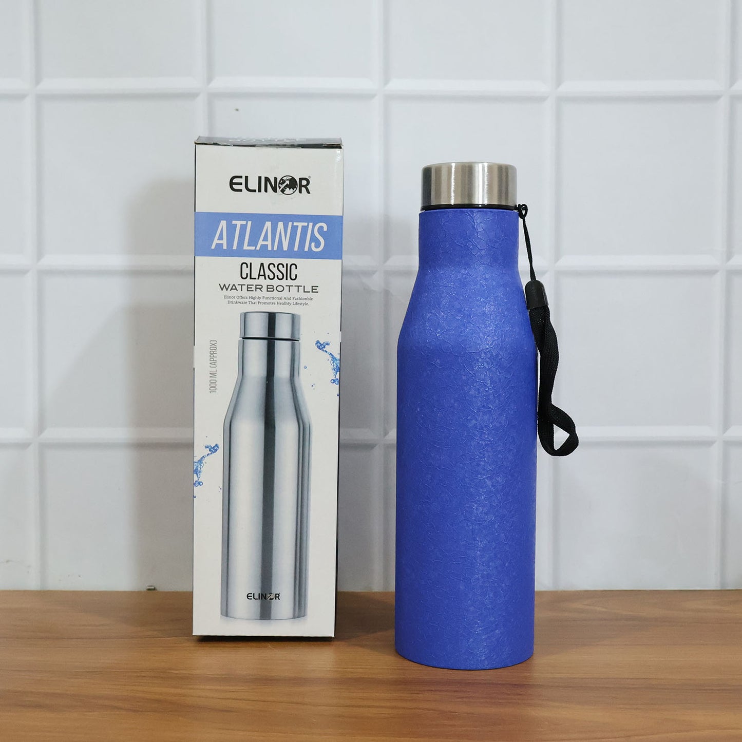 Blue Wukusy stainless steel water bottle with 1000ml capacity, sleek design, and durable construction.