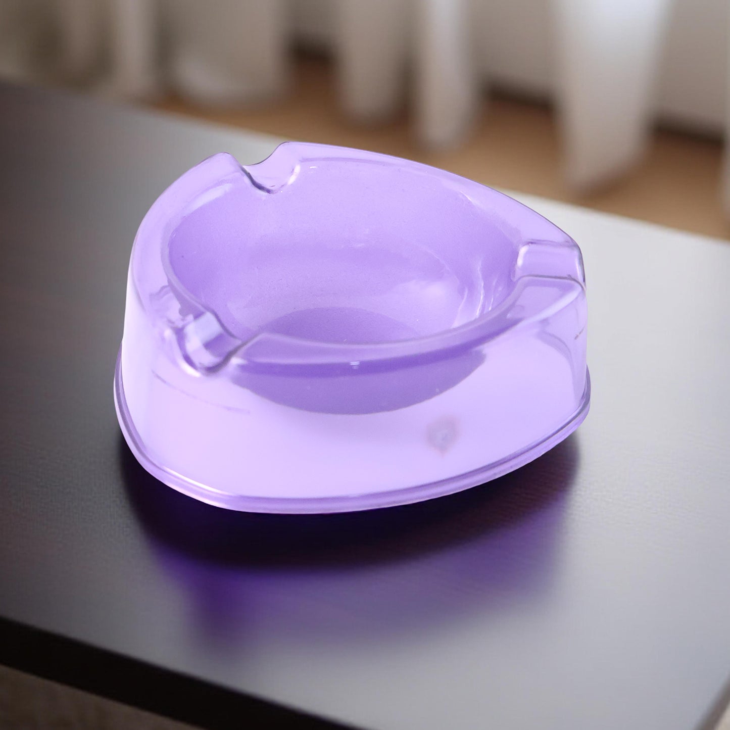 Wukusy Oblivion transparent purple plastic ashtray with a round shape and raised edges, ideal for home use.