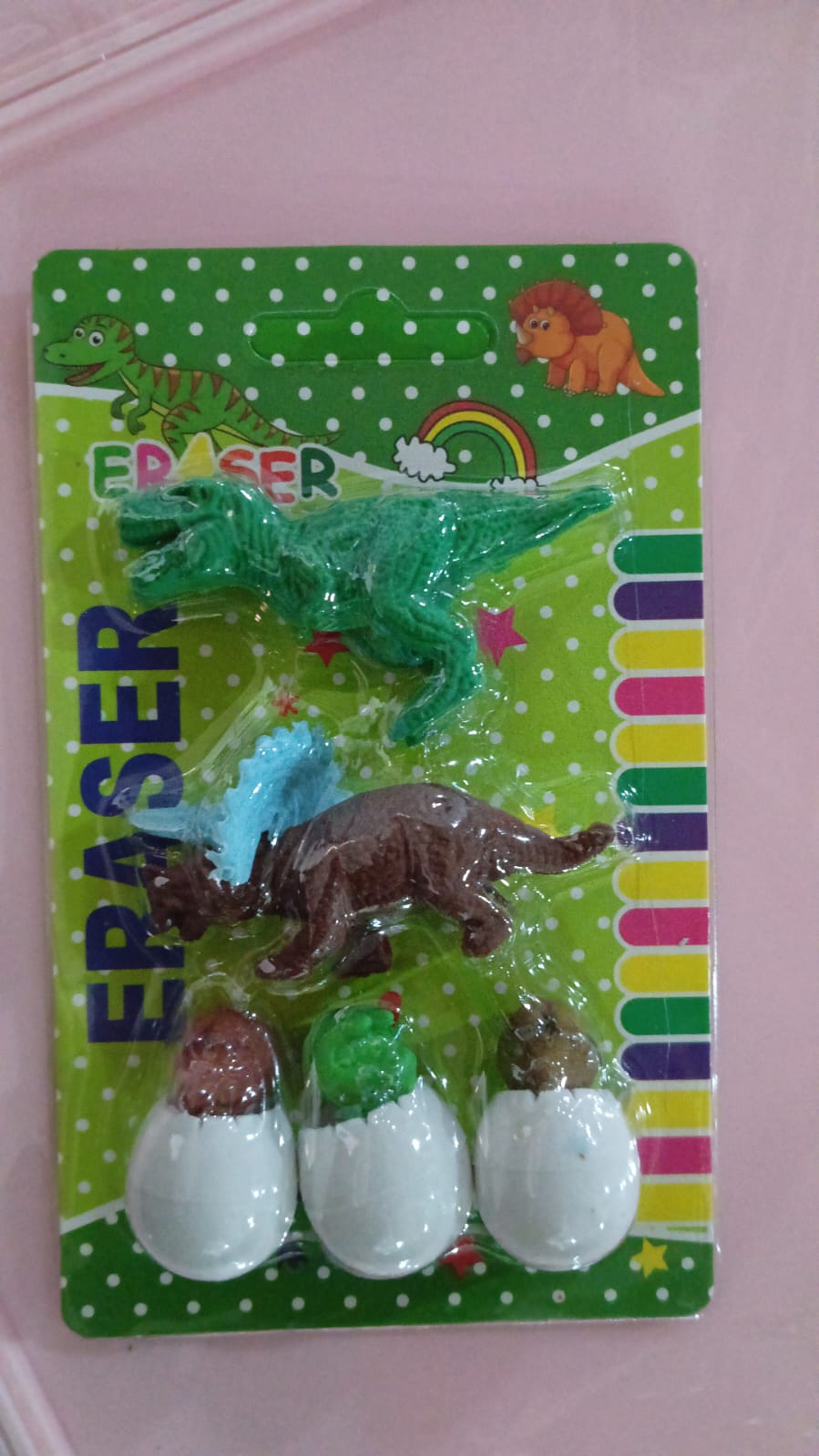 Set of five Wukusy dinosaur-shaped erasers featuring egg and 3D dinosaur designs, perfect for kids’ school supplies and desk accessories.