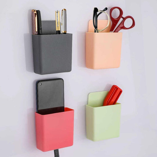 Set of four Wukusy plastic wall-mounted remote and mobile holder stands for convenient device storage.