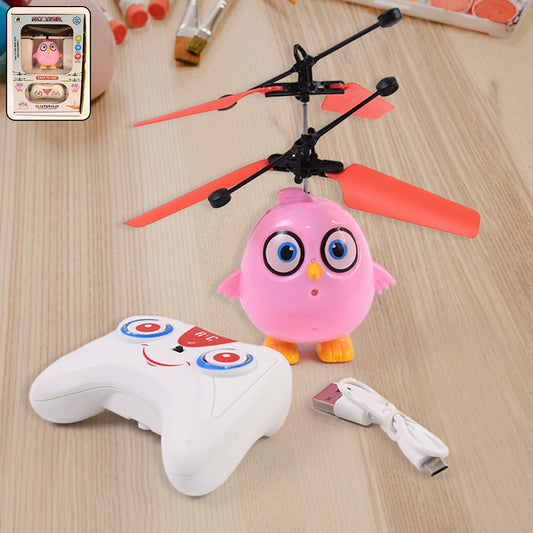 Pink owl-shaped flying RC toy with LED lights from Wukusy, featuring remote control and vibrant design in a set.