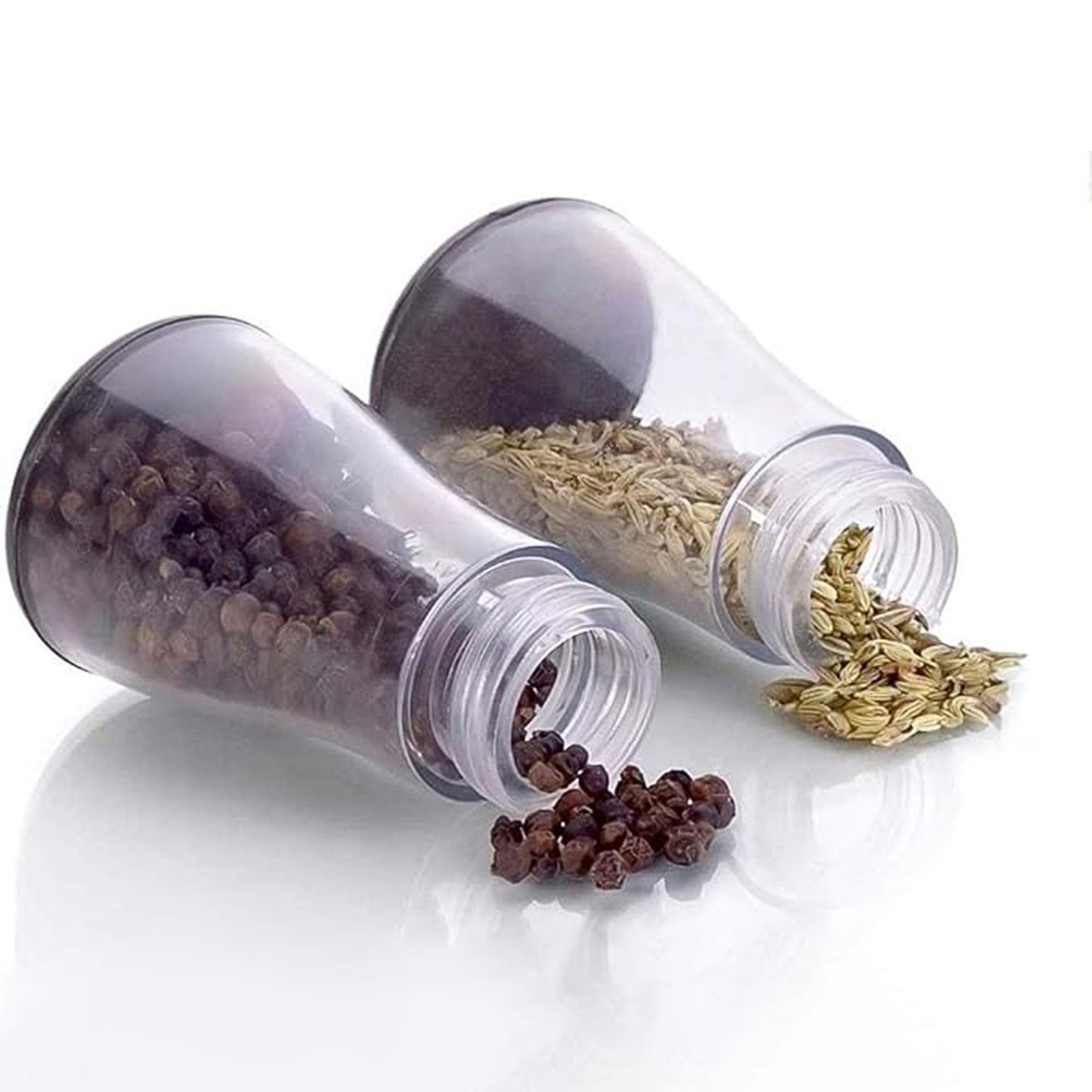 Six plastic spice jars with clear lids arranged on a stand, perfect for organizing spices in a home kitchen.